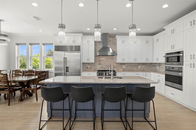 Built in 2021, this modern Mediterranean villa style home with