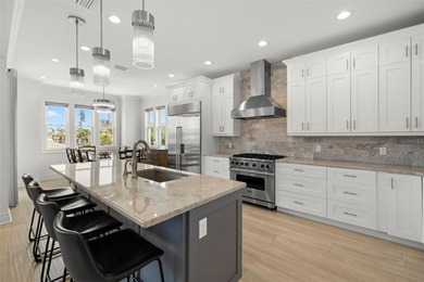 Built in 2021, this modern Mediterranean villa style home with