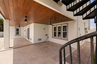 Built in 2021, this modern Mediterranean villa style home with