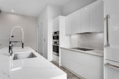 Beautifully designed and built in 2018, this modern townhouse