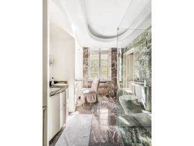 This exceptional 4,500 sqft co-op occupies an entire floor in a