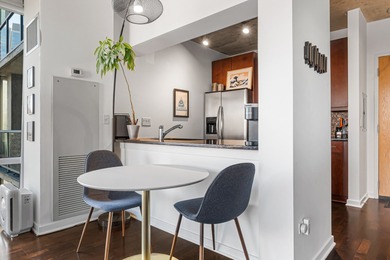 This bright and modern corner one bedroom unit at The Vetro