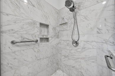 Live the dream in this spectacular Bay front oasis thoughtfully