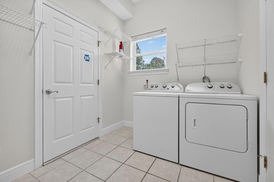 Live the dream in this spectacular Bay front oasis thoughtfully