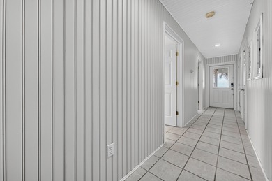 Live the dream in this spectacular Bay front oasis thoughtfully