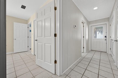 Live the dream in this spectacular Bay front oasis thoughtfully