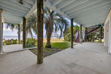 Live the dream in this spectacular Bay front oasis thoughtfully