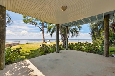 Live the dream in this spectacular Bay front oasis thoughtfully
