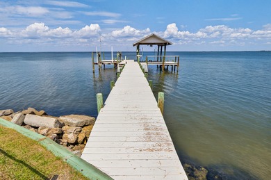 Live the dream in this spectacular Bay front oasis thoughtfully