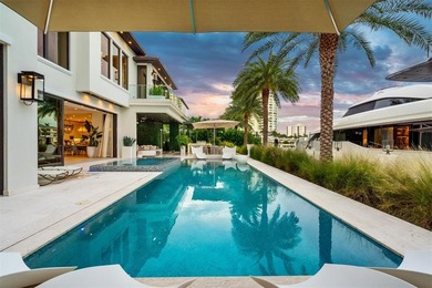 TIMELESS WATERFRONT MASTERPIECE IN EXCLUSIVE HARBOR BEACH! A