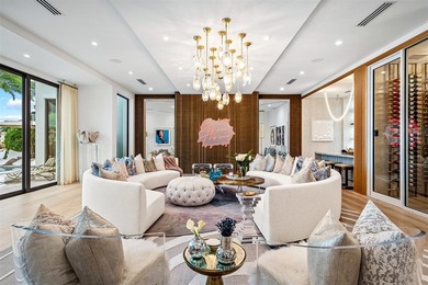 TIMELESS WATERFRONT MASTERPIECE IN EXCLUSIVE HARBOR BEACH! A