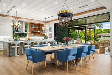 TIMELESS WATERFRONT MASTERPIECE IN EXCLUSIVE HARBOR BEACH! A