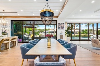 TIMELESS WATERFRONT MASTERPIECE IN EXCLUSIVE HARBOR BEACH! A