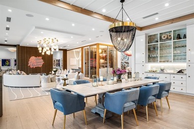 TIMELESS WATERFRONT MASTERPIECE IN EXCLUSIVE HARBOR BEACH! A