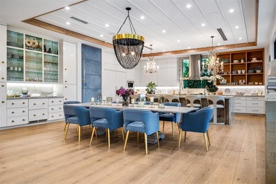 TIMELESS WATERFRONT MASTERPIECE IN EXCLUSIVE HARBOR BEACH! A