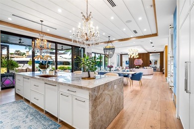 TIMELESS WATERFRONT MASTERPIECE IN EXCLUSIVE HARBOR BEACH! A