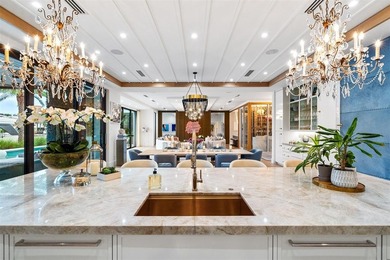 TIMELESS WATERFRONT MASTERPIECE IN EXCLUSIVE HARBOR BEACH! A