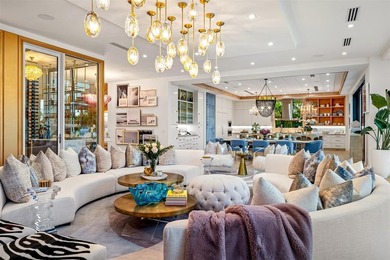 TIMELESS WATERFRONT MASTERPIECE IN EXCLUSIVE HARBOR BEACH! A