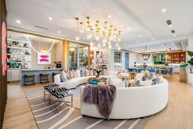 TIMELESS WATERFRONT MASTERPIECE IN EXCLUSIVE HARBOR BEACH! A