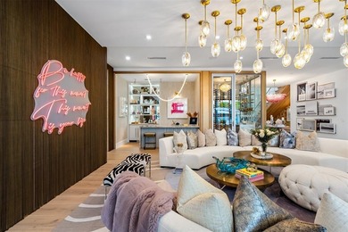 TIMELESS WATERFRONT MASTERPIECE IN EXCLUSIVE HARBOR BEACH! A