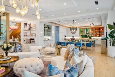 TIMELESS WATERFRONT MASTERPIECE IN EXCLUSIVE HARBOR BEACH! A