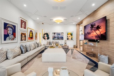 TIMELESS WATERFRONT MASTERPIECE IN EXCLUSIVE HARBOR BEACH! A