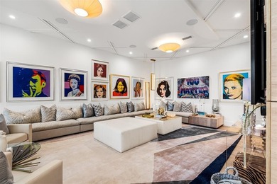 TIMELESS WATERFRONT MASTERPIECE IN EXCLUSIVE HARBOR BEACH! A