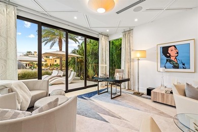 TIMELESS WATERFRONT MASTERPIECE IN EXCLUSIVE HARBOR BEACH! A