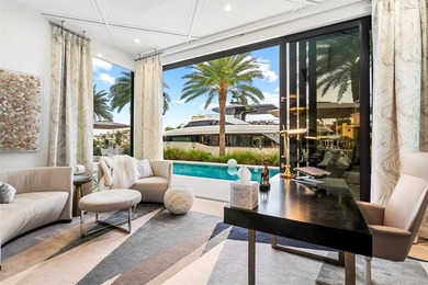 TIMELESS WATERFRONT MASTERPIECE IN EXCLUSIVE HARBOR BEACH! A