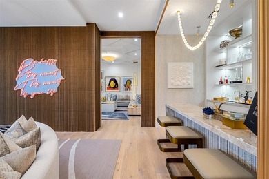 TIMELESS WATERFRONT MASTERPIECE IN EXCLUSIVE HARBOR BEACH! A