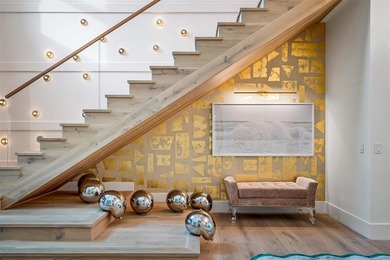 TIMELESS WATERFRONT MASTERPIECE IN EXCLUSIVE HARBOR BEACH! A