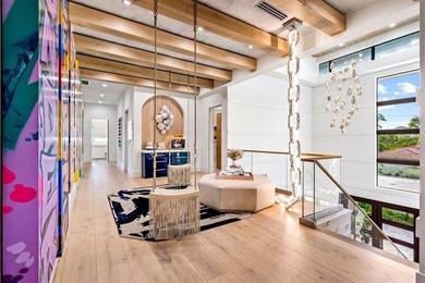 TIMELESS WATERFRONT MASTERPIECE IN EXCLUSIVE HARBOR BEACH! A