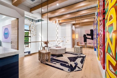 TIMELESS WATERFRONT MASTERPIECE IN EXCLUSIVE HARBOR BEACH! A