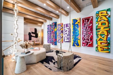 TIMELESS WATERFRONT MASTERPIECE IN EXCLUSIVE HARBOR BEACH! A