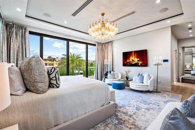 TIMELESS WATERFRONT MASTERPIECE IN EXCLUSIVE HARBOR BEACH! A