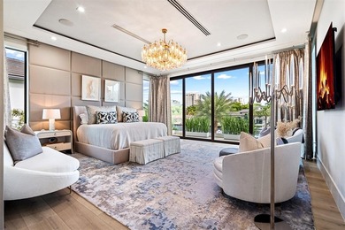 TIMELESS WATERFRONT MASTERPIECE IN EXCLUSIVE HARBOR BEACH! A