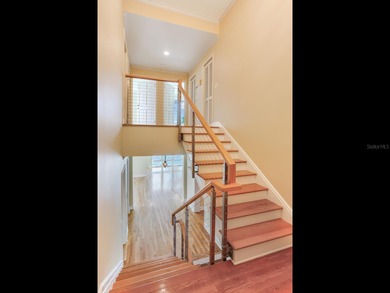 This corner, open-bay and downtown water view villa is truly a