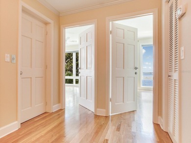 This corner, open-bay and downtown water view villa is truly a