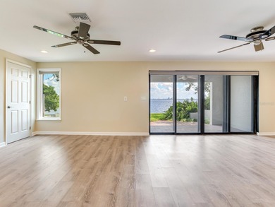 This corner, open-bay and downtown water view villa is truly a