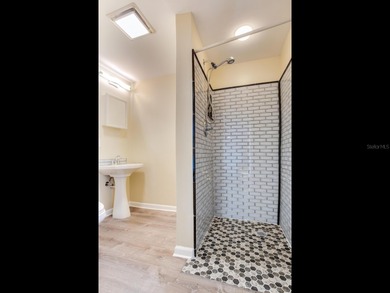 This corner, open-bay and downtown water view villa is truly a