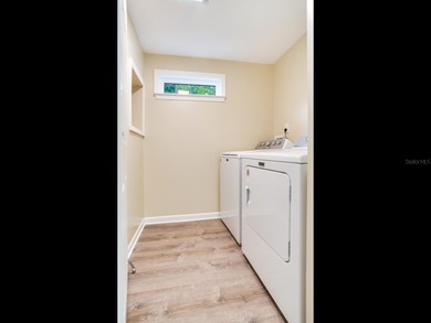 This corner, open-bay and downtown water view villa is truly a