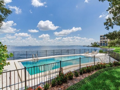 This corner, open-bay and downtown water view villa is truly a
