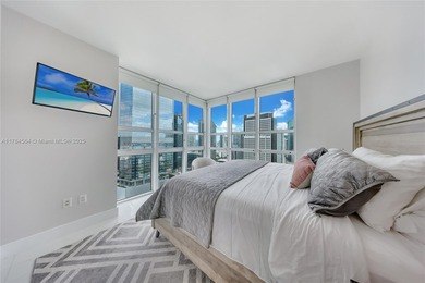 Live in the heart of Brickell with stunning city views from this