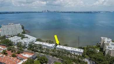 This corner, open-bay and downtown water view villa is truly a