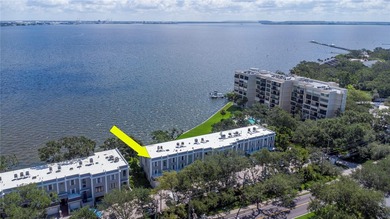 This corner, open-bay and downtown water view villa is truly a