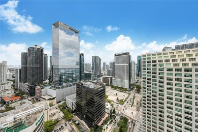 Live in the heart of Brickell with stunning city views from this