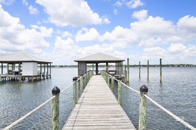 Gated and secure, this waterfront property offers the utmost