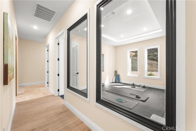 Perched high above Cross Creek Golf Course in the prestigious De