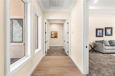 Perched high above Cross Creek Golf Course in the prestigious De