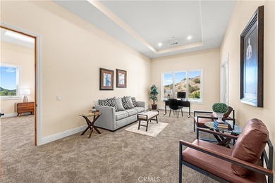 Perched high above Cross Creek Golf Course in the prestigious De